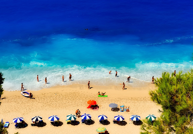 protezione solare crema raggi violetti spiaggia tintarella